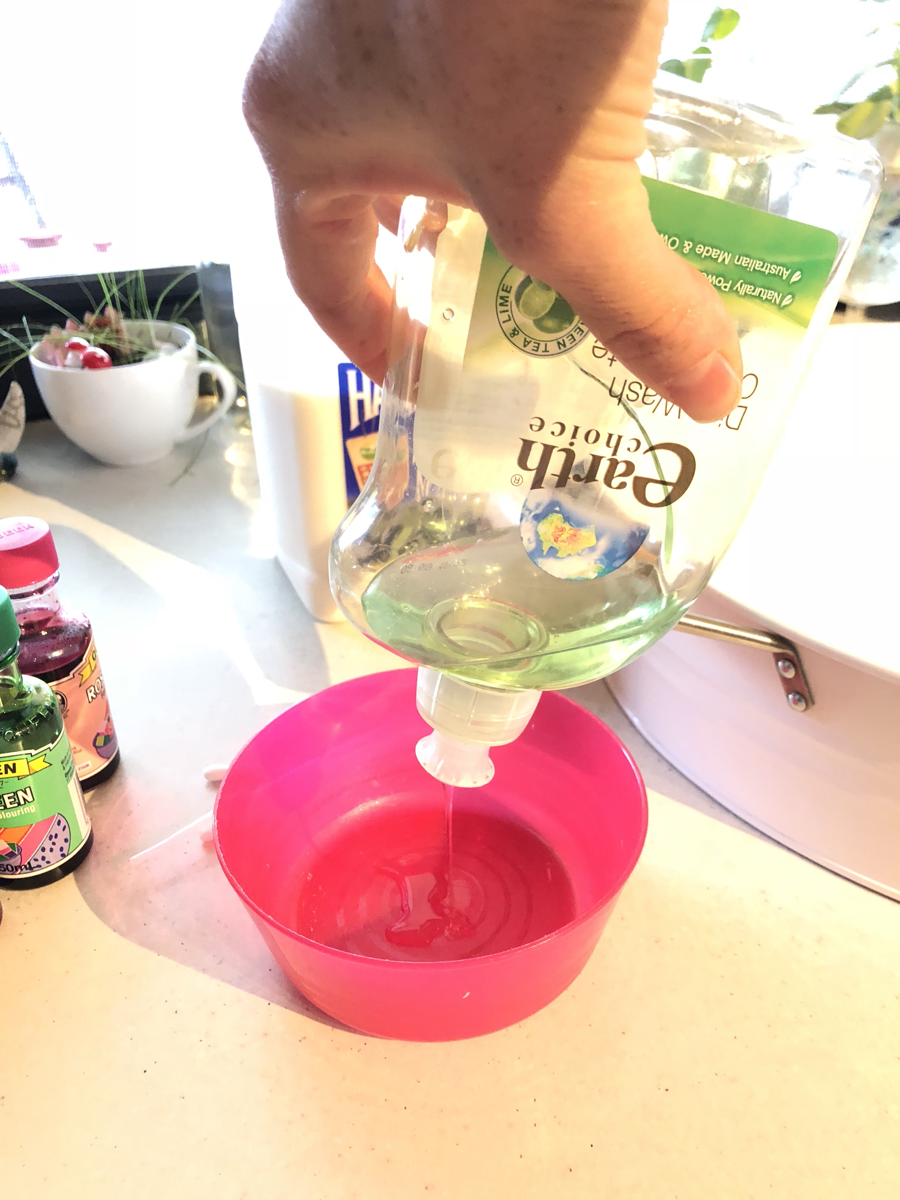 dishwashing liquid in bowl for magic milk experiment
